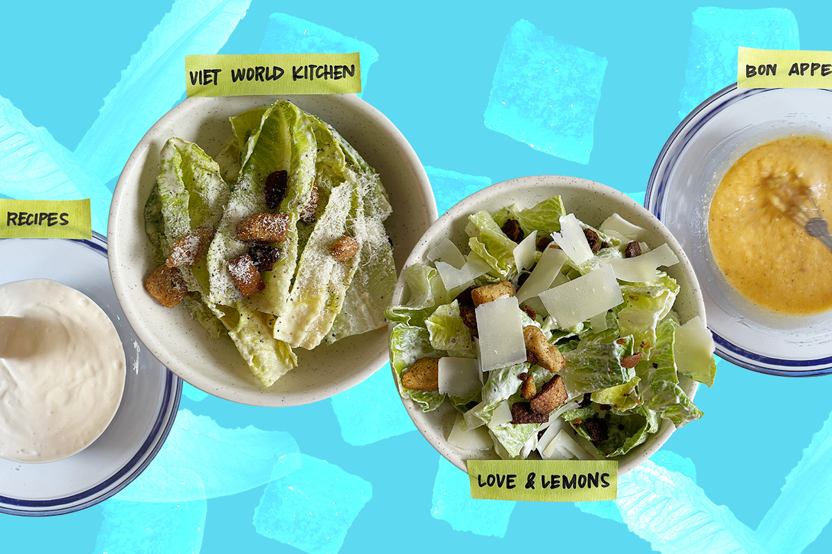 Two bowls of Caesar salad with two bowls of dressing, superimposed on a bright blue backdrop. Photo illustration.
