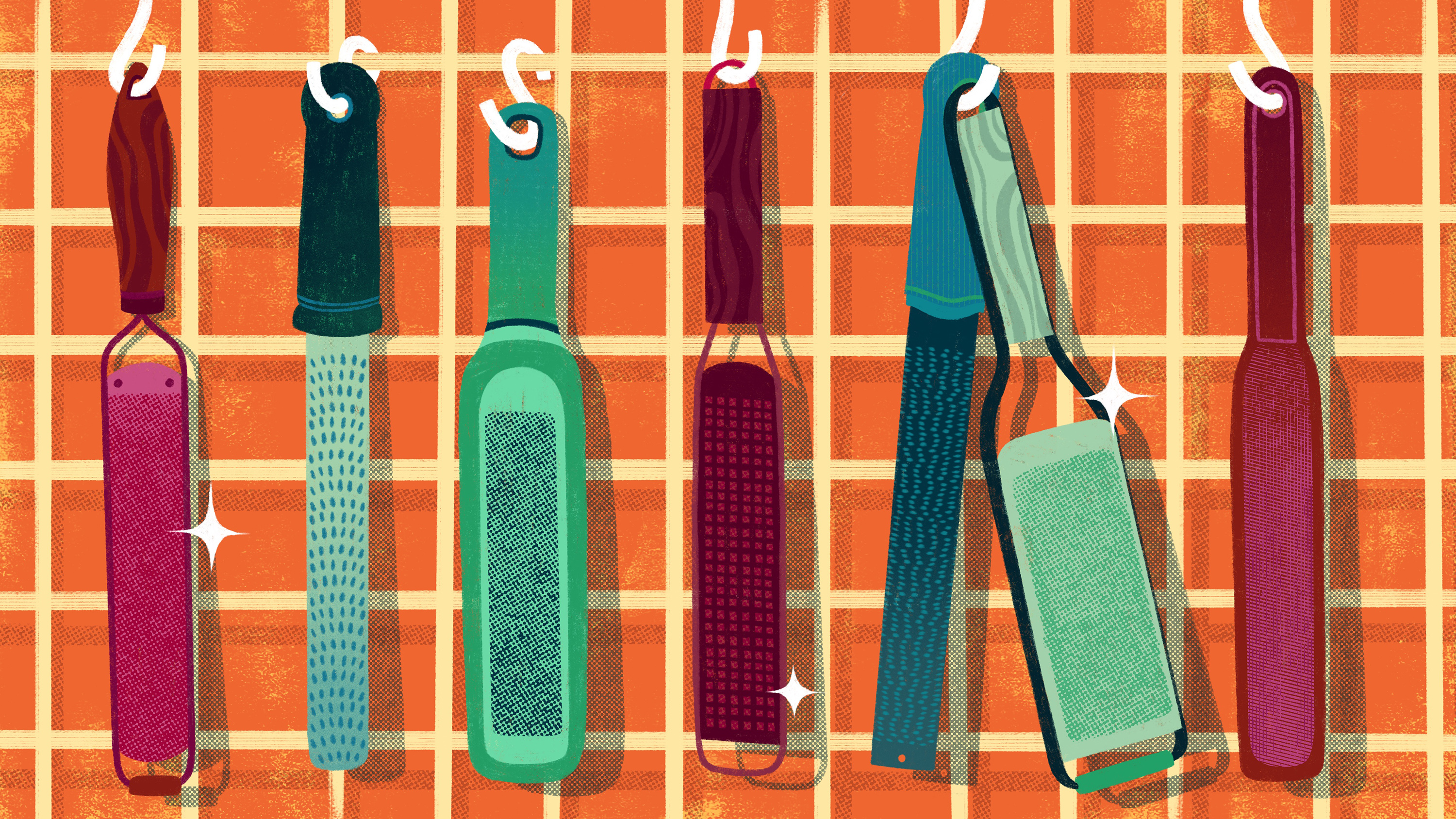 Different styles of Microplane zesters hang on hooks on an orange-tiled wall. Illustration.